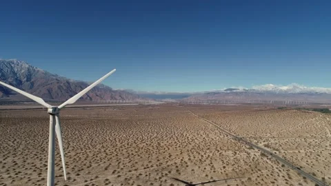 Windmill in the Coachella Valley Snow Capped Mountains in the Morning 스톡 동영상 147163876