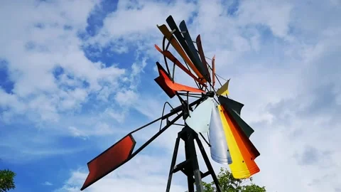 Windmill, Colourful Windmill, Gently Spinning, Patterned Blue Sky Video stock 138460444