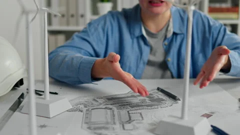 Windmill, Design Engineer Confident Brainstorming with Colleagues Miniature Stock Footage 232005385
