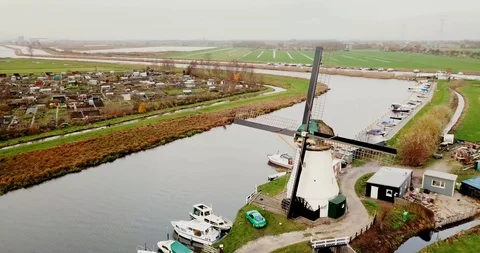 Windmill drone to town Video stock 101141230