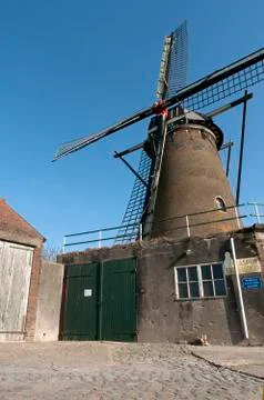 Windmill in Dutch landscape Fotos Stock