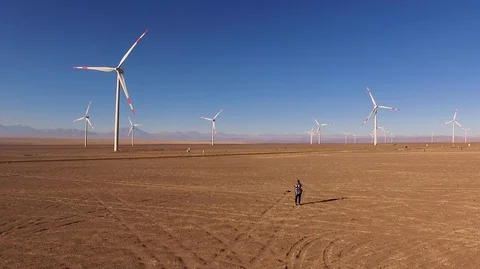 Windmill Farm and Person at Atacama Desert 12 Stock Footage