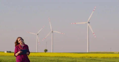 Windmill Farm Engineer at Renewable Power Alternative Energy Farm Stock Footage 204026635