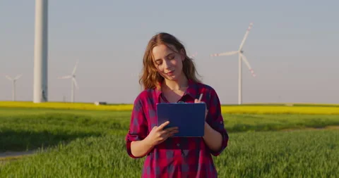 Windmill Farm Engineer at Renewable Power Alternative Energy Farm Stock Footage 204026832