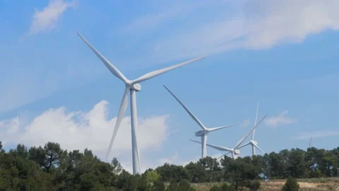 Windmill farm, wind electro eco energy, turbines on blue sky background on Stock Footage 193751166
