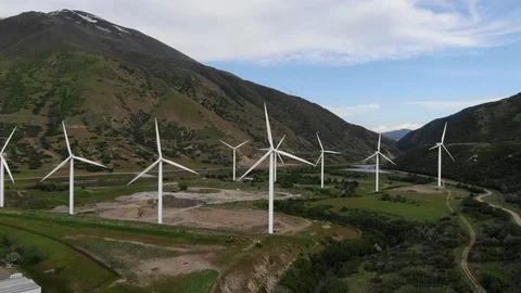 Windmill Farm wind park wind turbines Sunset Colors Farmland Field Wasatch Stock-Footage 110107447