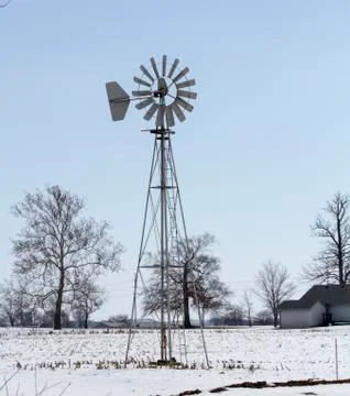 Windmill In A Field After A Snowfall 写真素材