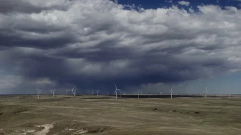 Windmill Field with Approaching Lightning Storm 4K Stock Footage 200792203
