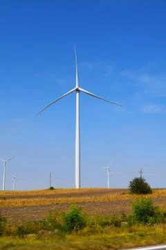 Windmill in field 스톡 사진