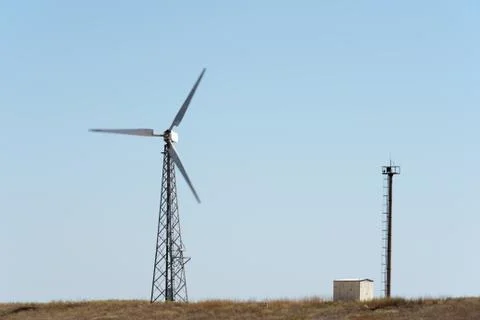 Windmill on field at tower Stock Photos