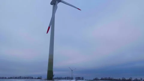 Windmill generates clean electrical energy Stock Footage 168927423