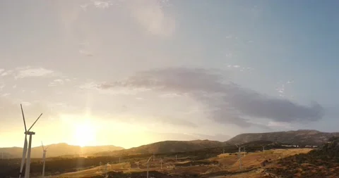 Windmill generator top wiev on the beautiful background. Sunset nature Stock Footage 141310190