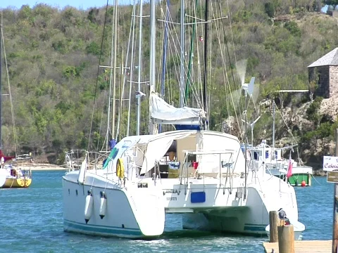 Windmill generators on boats in marina Stock Footage 709290