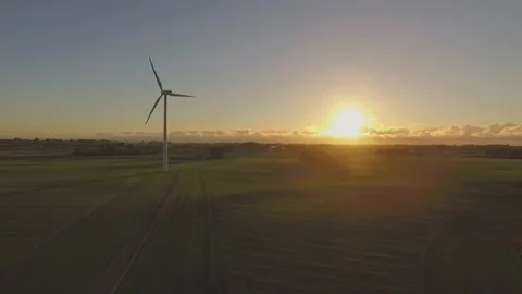 Windmill green field sunset Video stock 272181730
