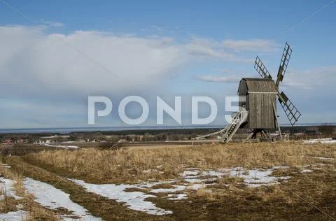 Windmill on a hill Stock Photos
