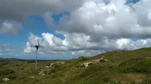 A windmill on a hillside Stock Footage 118994018