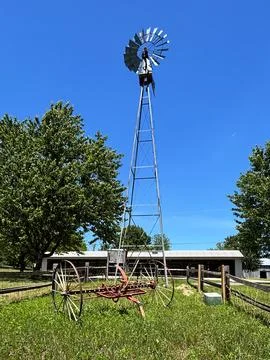 Windmill-low-angle-farm-park Stock Photos