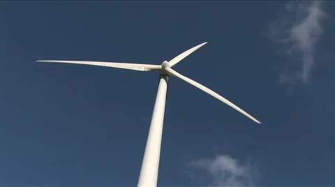 Windmill low angle shot with 2 flocks of cumulus cloud Video stock 5700990