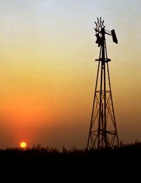 Windmill &amp; Low Red Sunset Photos