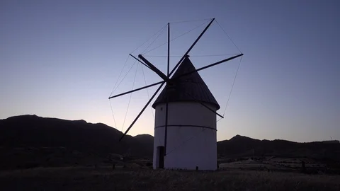 Windmill on the mountain at sunset, Almeria Video stock 90783151