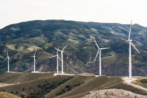 Windmill in mountains Stock Photos