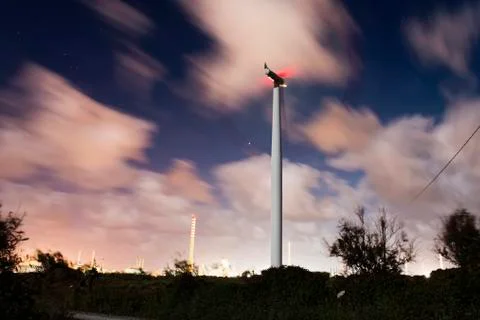 Windmill at night and cloudy sky Stock Photos