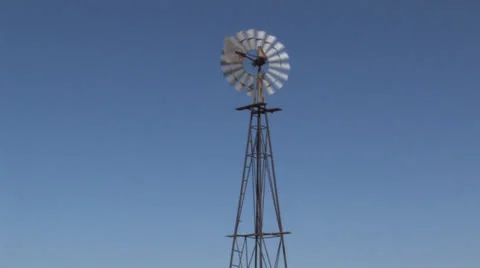 Windmill to oil pump Stock Footage 25057648