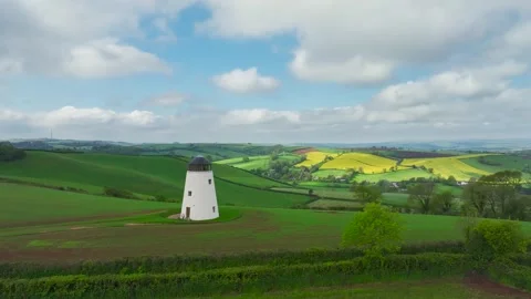 Windmill over fields and farms from a drone, Torquay, Devon, England Stock-Footage 255962279