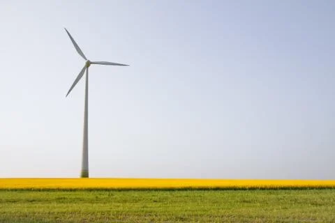Windmill over horizon Stock Photos