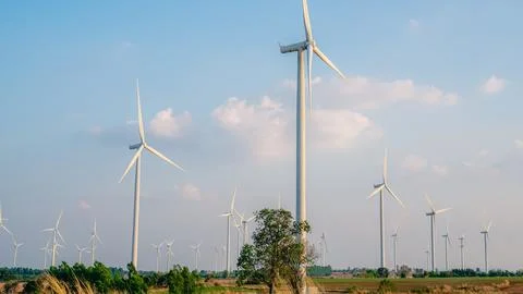 Windmill park with cloud and a blue sky, Wind turbine field Foto stock