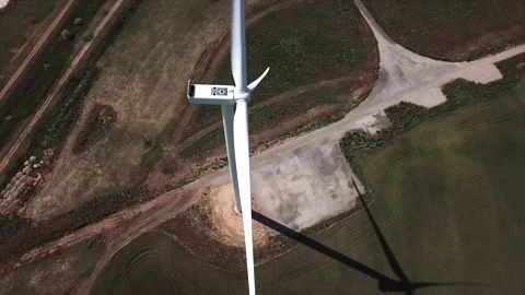 Windmill park generating electricity and power. Aerial video of wind powered Stock Footage 208315413
