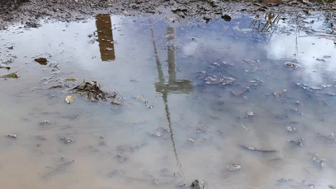 Windmill puddle reflection Stock Footage 126551037