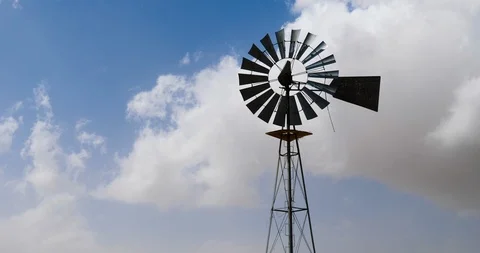Windmill on a Ranch Time Lapse with Moving Clouds Stock Footage 108629607