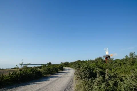 Windmill at roadside Stock Photos