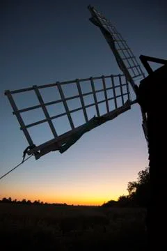 Windmill sail at sunset Stock Photos