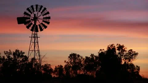 Windmill Silhouette with beautiful sunset sunrise sky Stock Footage