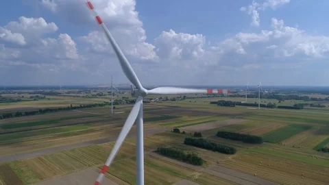 The windmill is spinning, in the background other windmills, air Stock Footage 78975548
