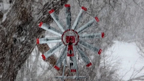 Windmill spinning in a heavy snow. Stock Footage 103347397