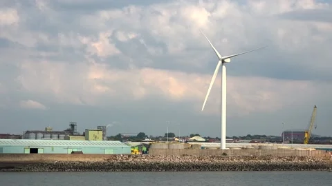 Windmill spinning by the sea Stock Footage 166143314