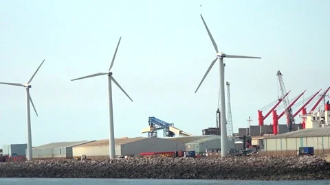 Windmill spinning by the sea Stock Footage 166143347