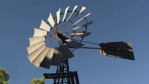 Windmill spinning in slow motion Stock Footage 91675417