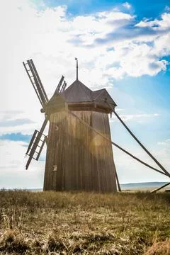 A windmill is standing in a field in Arkaim Ural Russia. Stock Photos