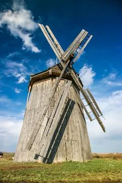 A windmill is standing in a field in Arkaim Ural Russia. Stock Photos