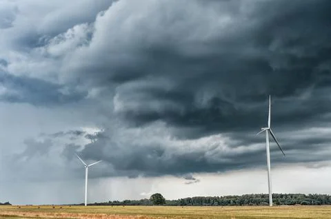 Windmill with Stormy Sky. Cloudy Sky over the Wheat Field Stock Photos