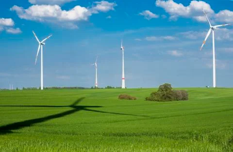 Windmill on summer landscape Stock Photos