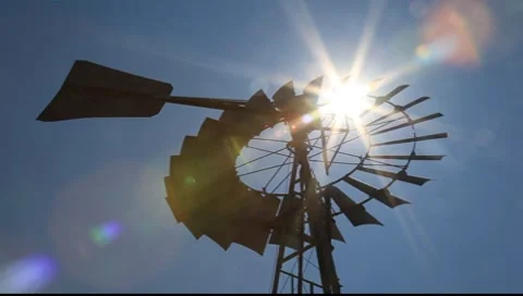 Windmill with sun flare Video stock 8651647