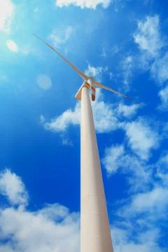 Windmill in sunny day Stock Photos