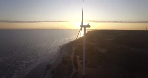 Windmill sunrise ocean Stock Footage 144375161