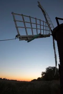 Windmill at sunset Stock Photos