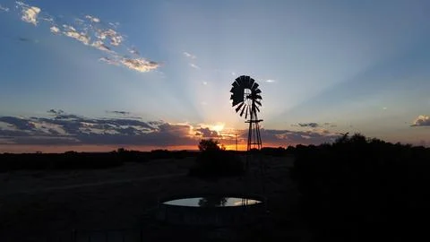 Windmill sunset Stock Photos